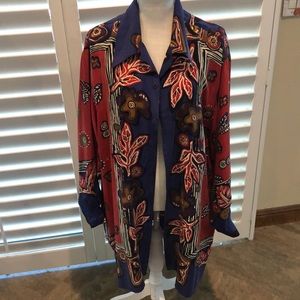 Silk long sleeve blouse. Wonderful feel. Wear like a duster. 100% silk. Washable